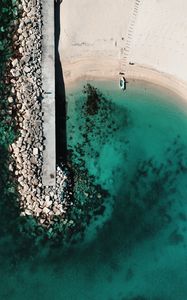 Preview wallpaper boat, sea, beach, stones, aerial view