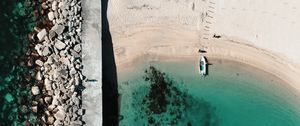 Preview wallpaper boat, sea, beach, stones, aerial view