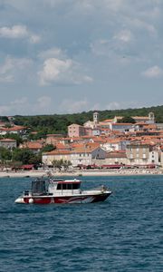 Preview wallpaper boat, sea, buildings, sky