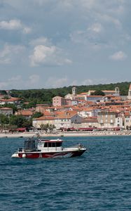 Preview wallpaper boat, sea, buildings, sky