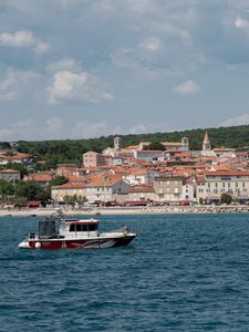 Preview wallpaper boat, sea, buildings, sky