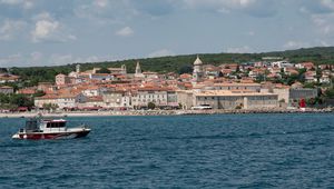 Preview wallpaper boat, sea, buildings, sky