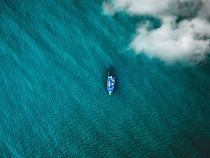 Preview wallpaper boat, sea, clouds, top view