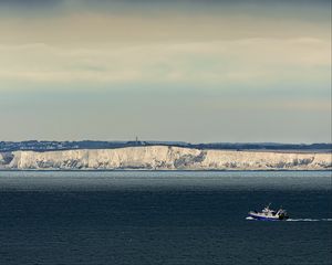 Preview wallpaper boat, sea, coast, cliff