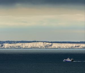 Preview wallpaper boat, sea, coast, cliff