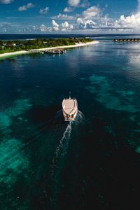 Preview wallpaper boat, sea, coast, island, landscape