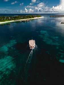 Preview wallpaper boat, sea, coast, island, landscape