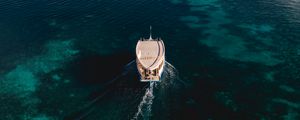 Preview wallpaper boat, sea, coast, island, landscape