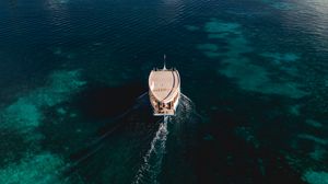 Preview wallpaper boat, sea, coast, island, landscape