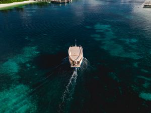 Preview wallpaper boat, sea, coast, island, landscape