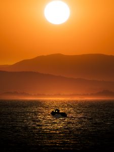 Preview wallpaper boat, sea, hills, silhouettes, sunset