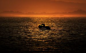 Preview wallpaper boat, sea, hills, silhouettes, sunset
