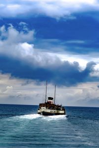 Preview wallpaper boat, sea, ocean, clouds, sky