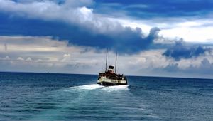 Preview wallpaper boat, sea, ocean, clouds, sky