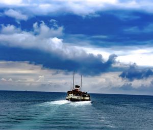 Preview wallpaper boat, sea, ocean, clouds, sky