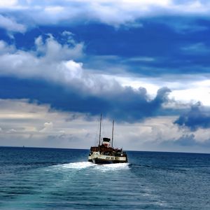 Preview wallpaper boat, sea, ocean, clouds, sky