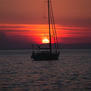 Preview wallpaper boat, sea, sunset, dusk