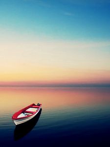 Preview wallpaper boat, sea, water surface, loneliness, night, sunset, skyline