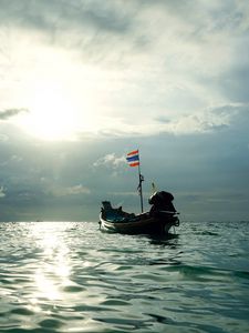 Preview wallpaper boat, sea, waves, clouds, sunset