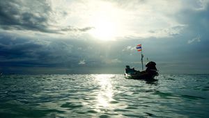 Preview wallpaper boat, sea, waves, clouds, sunset
