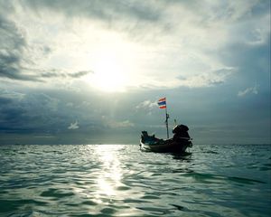 Preview wallpaper boat, sea, waves, clouds, sunset