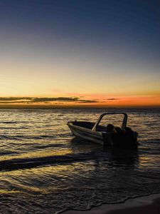Preview wallpaper boat, sea, waves, sunset