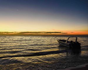 Preview wallpaper boat, sea, waves, sunset