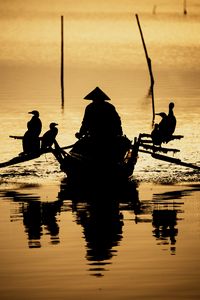 Preview wallpaper boat, silhouette, dark, river, oars, birds, reflection