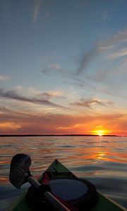 Preview wallpaper boat, sunset, horizon, canoe, sky