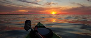 Preview wallpaper boat, sunset, horizon, canoe, sky