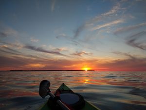 Preview wallpaper boat, sunset, horizon, canoe, sky