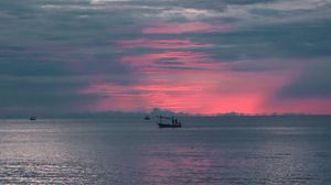 Preview wallpaper boat, sunset, sea, coast, sky