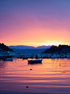 Preview wallpaper boat, sunset, sea, glare, waves