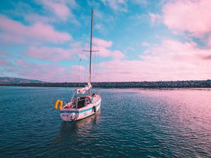 Preview wallpaper boat, sunset, skyline, pink, california