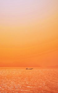 Preview wallpaper boat, sunset, sunlight, red, lake, ripples