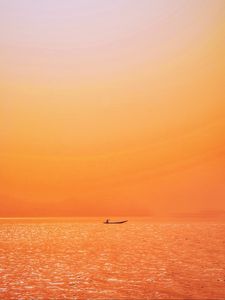 Preview wallpaper boat, sunset, sunlight, red, lake, ripples