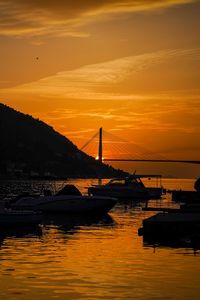 Preview wallpaper boats, bay, bridge, sunset, dark