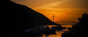 Preview wallpaper boats, bay, bridge, sunset, dark