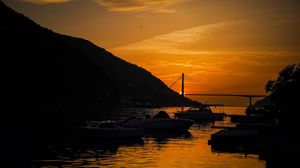 Preview wallpaper boats, bay, bridge, sunset, dark