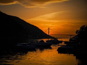 Preview wallpaper boats, bay, bridge, sunset, dark