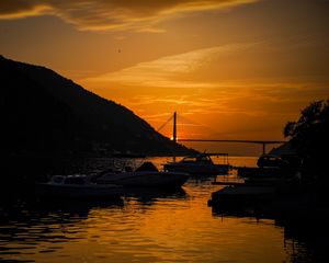 Preview wallpaper boats, bay, bridge, sunset, dark