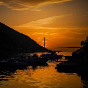 Preview wallpaper boats, bay, bridge, sunset, dark