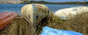 Preview wallpaper boats, canoes, grass, sea, hills