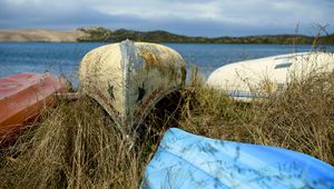 Preview wallpaper boats, canoes, grass, sea, hills