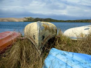 Preview wallpaper boats, canoes, grass, sea, hills