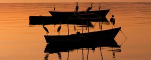 Preview wallpaper boats, cranes, silhouettes, twilight, water