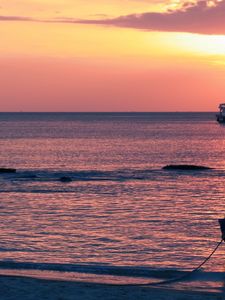 Preview wallpaper boats, decline, ocean, sky, coast, horizon