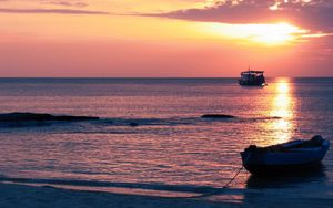 Preview wallpaper boats, decline, ocean, sky, coast, horizon