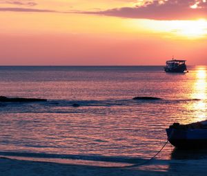 Preview wallpaper boats, decline, ocean, sky, coast, horizon