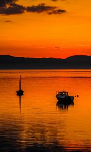 Preview wallpaper boats, lake, hills, sunset